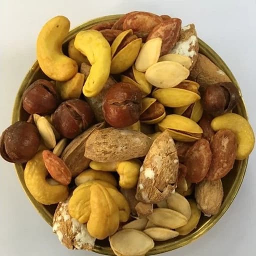 اجیل زعفرانی پوست دار500گرم(پسته با پوست بادام فندق با پوست بادام هندی وتخمه ها )