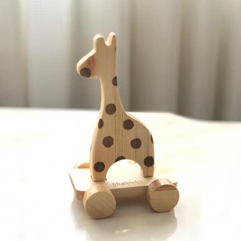 اسباب بازی زرافه چرخ دار چوبی ارتفاع 23 عرض 10 — تصویر ۲
