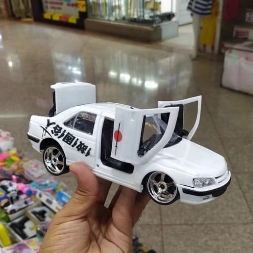 اسباب بازی ماشین پژو پارس شوتی پنوماتیک کف خواب سفید