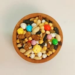 آجیـل مولـودی (مشکل گشا) لوکـــس 7مغز(1000گرمی)در پاکت زیپدار — تصویر ۳