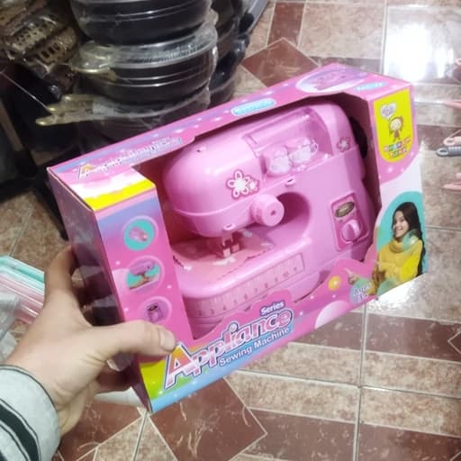 اسباب بازی چرخ خیاطی باطری خور