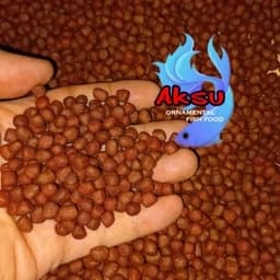 غذای ماهی رنگ دوپینگی رنگدانه گوشتخوار و گیاه خوار یک کیلویی زیرابی در انواع سایز درخواستی — تصویر ۵