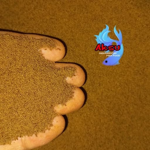 غذای ماهی 0.5 میل گوپی بیومار سومو محرک رشد و رنگ و باله یک کیلویی