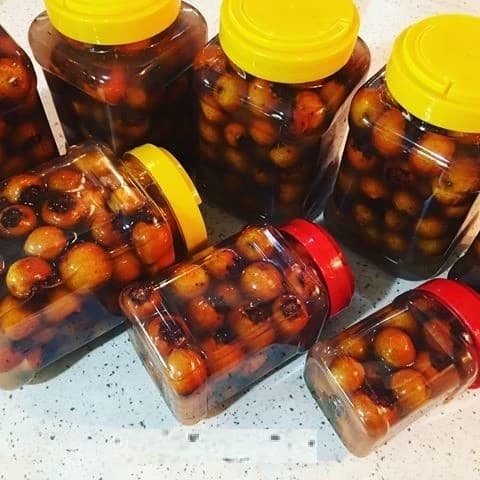 ترشی کونوس،ترشی ازگیل،کونوس ترشی،آب کونوس،1000 گرمی گیلان.رشت