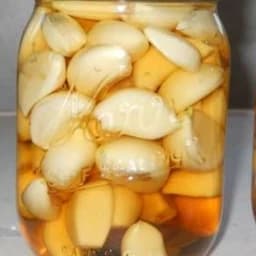 ترشی سیر صدفی محلی شمال 5ساله ظرف 750گرمی — تصویر ۳