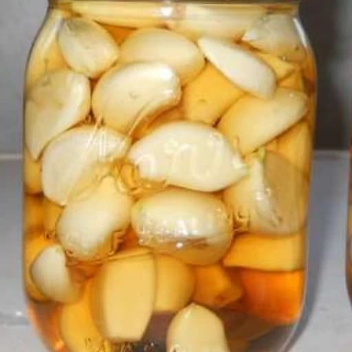 ترشی سیر صدفی محلی شمال 5ساله ظرف 750گرمی — تصویر ۲
