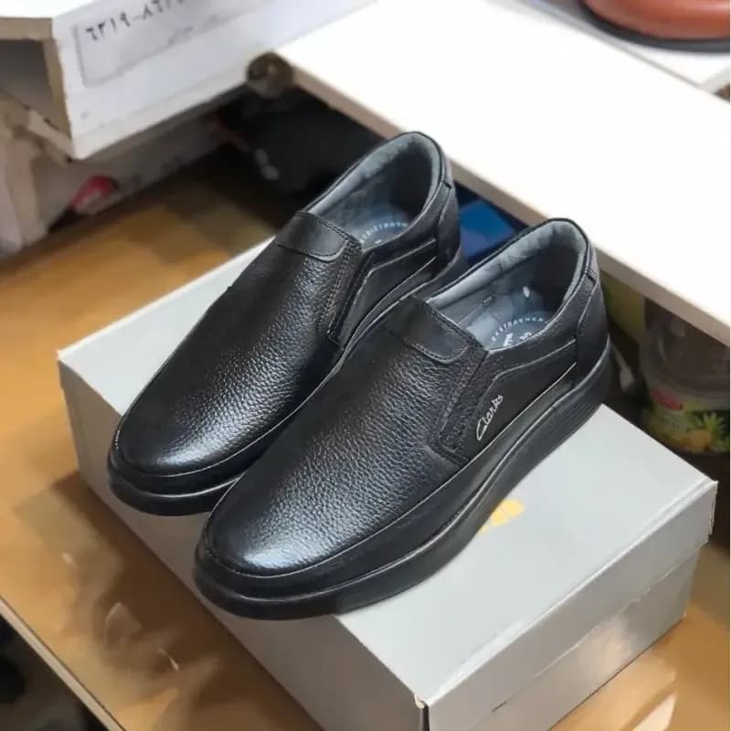 کفش چرم مردانه مشکی بی بند رویه و کفی طبی چرم طبیعی زیره پیو سبک و منعطف — تصویر ۹