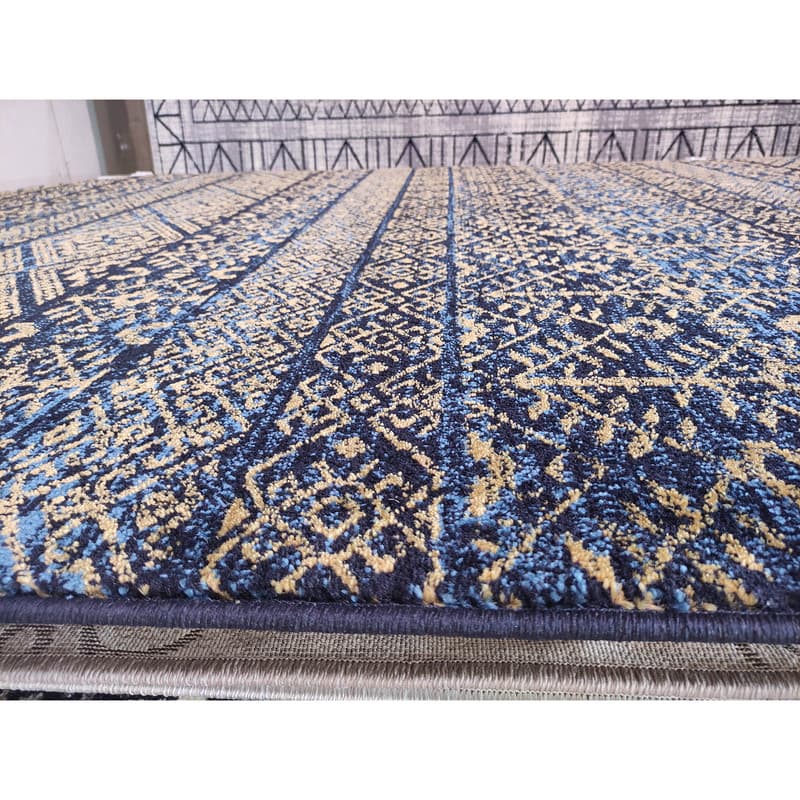 فرش ماشینی زمرد مشهد کد 602 زمینه سورمه ای آبی — تصویر ۵
