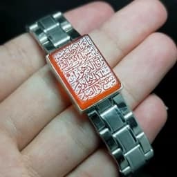 دستبند نقره بند رولکسی 925 عیار دست ساز نگین عقیق خراسانی پرتقالی حکاکی شده مزین به دعای حرز امام جواد ع (صغیر) — تصویر ۳