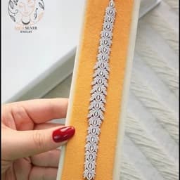 دستبند نقره زنانه نگین کاری شده طرح پرکار 925 عیار با روکش طلای سفید همراه فاکتور 21 — تصویر ۳