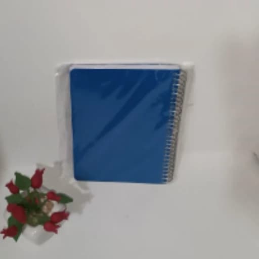 دفترچه یادداشت جلد طلقی بغل سیمی سایز 1.8 تک رنگ