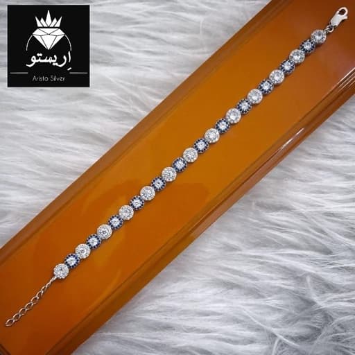 دستبند نقره جواهری میکرو با نگینهای زیرکنیا کبود عیار 925 و آبکاری طلاسفید