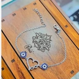 دستبند نقره زنانه قلب بی نهایت چشم نظر عیار 925 آبکاری طلا سفید — تصویر ۳