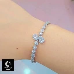 دستبند نقره زنانه فلاور اشکی باقفل آسانسوری عیار 925 و آبکاری طلا سفید — تصویر ۳