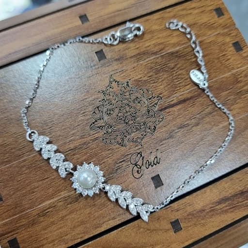 دستبند نقره زنانه گل مروارید عیار925 آبکاری طلا سفید