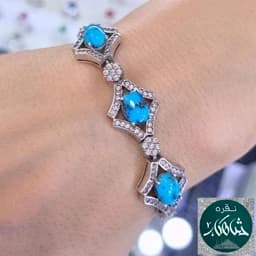 دستبند نقره زنانه شاهکار فیروزه نیشابور اصل عیار 925 و آبکاری طلاسفید بسیار زیبا و لوکس — تصویر ۳