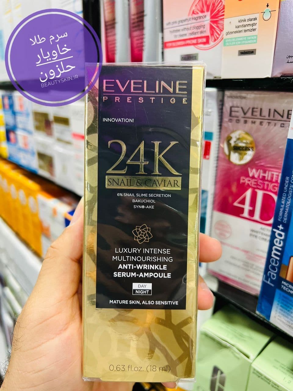 سرم طلا و حلزون اولاین eveline — تصویر ۳