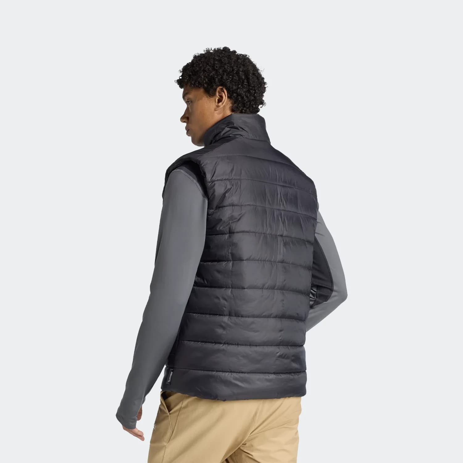 پافر مردانه آدیداس مدل Terrex Multi Essentials CLIMAWARM Padded Vest — تصویر ۴