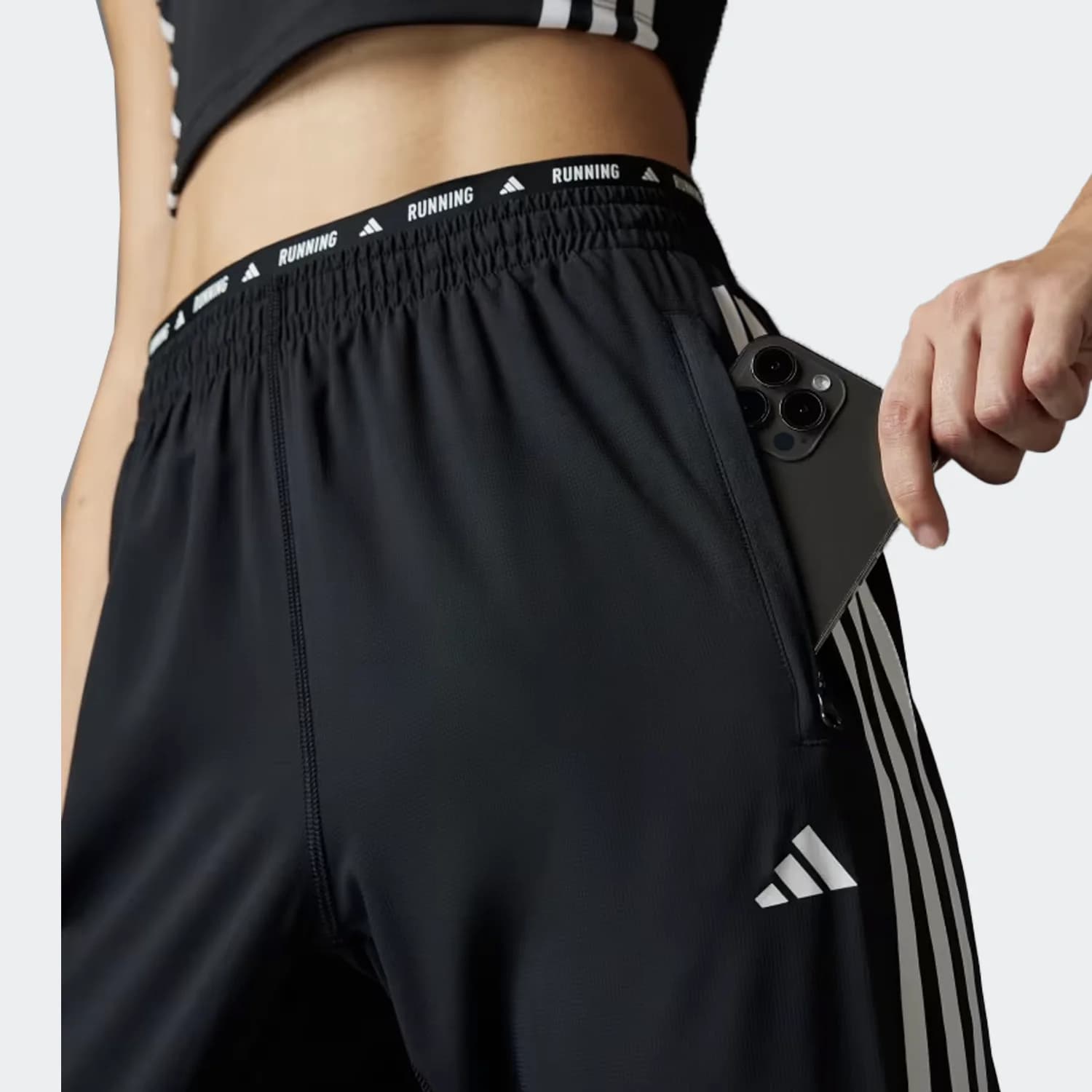 شلوار زنانه آدیداس مدل Own the Run 3-Stripes Pants — تصویر ۱۰