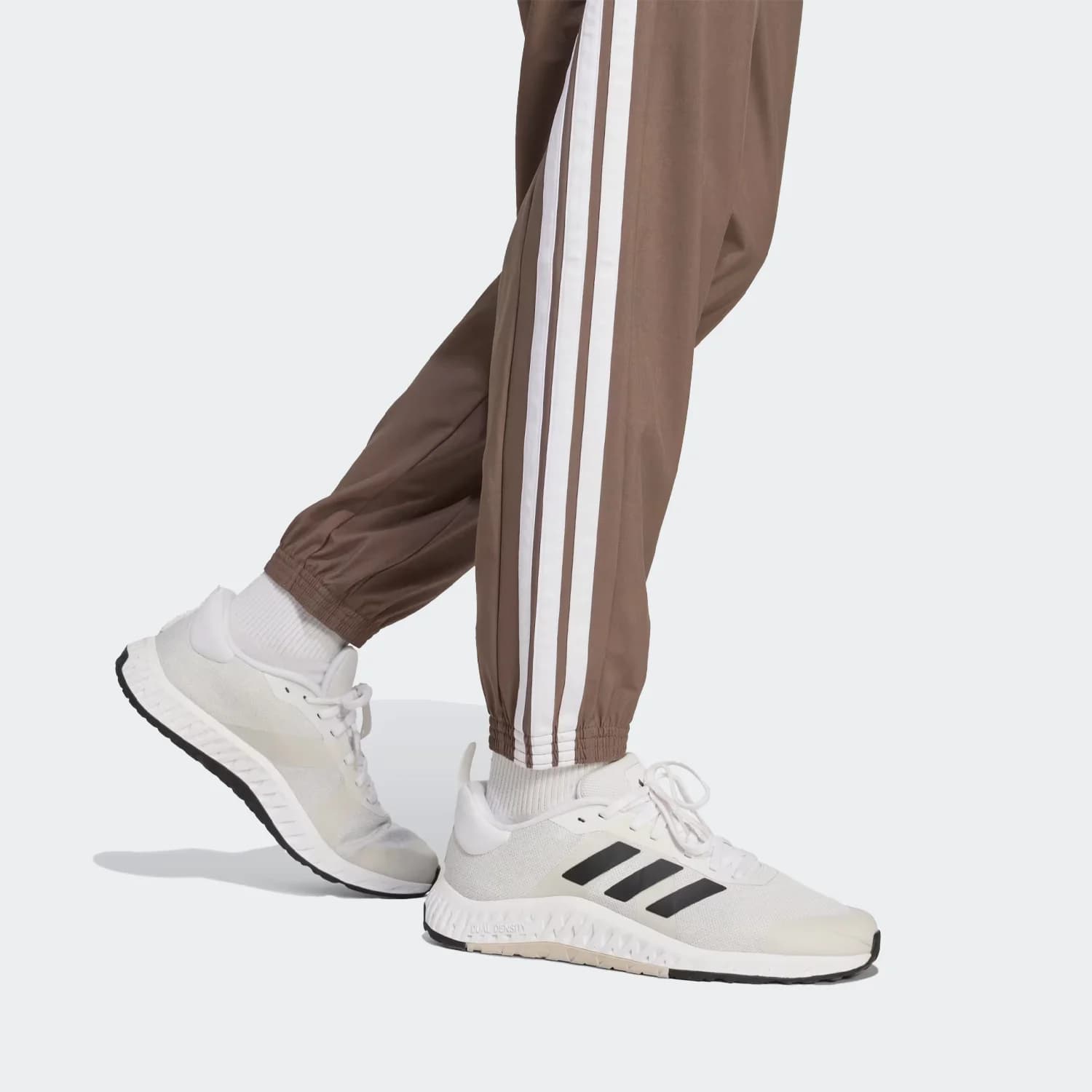 شلوار زنانه آدیداس مدل Train Essentials 3-Stripes Woven Joggers — تصویر ۱۱