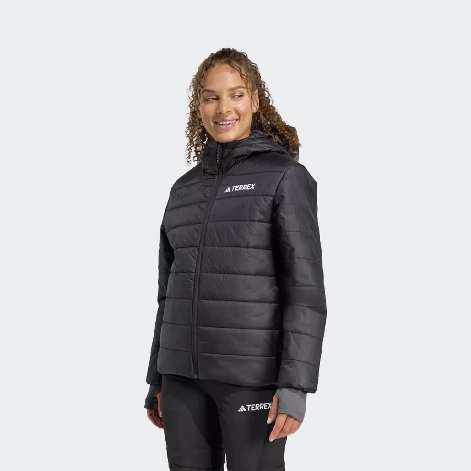 کاپشن زنانه آدیداس مدل Terrex Multi Essentials CLIMAWARM Insulated Hooded Jacket — تصویر ۳
