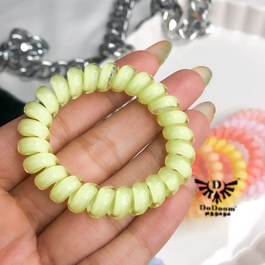 کش مو سیم تلفنی رنگ روشن K59 — تصویر ۴