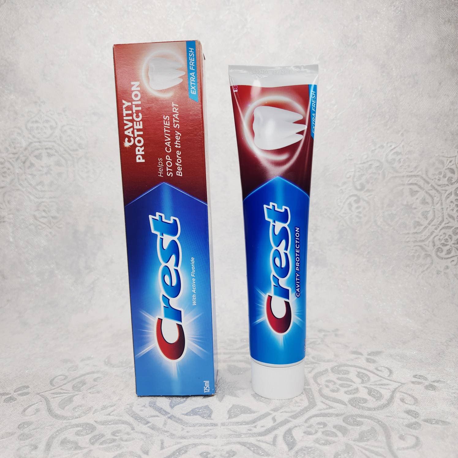 خمیر دندان کرست Crest اصل سری Cavity Protection مدل Extra Fresh حجم 125 میلی لیتر — تصویر ۲