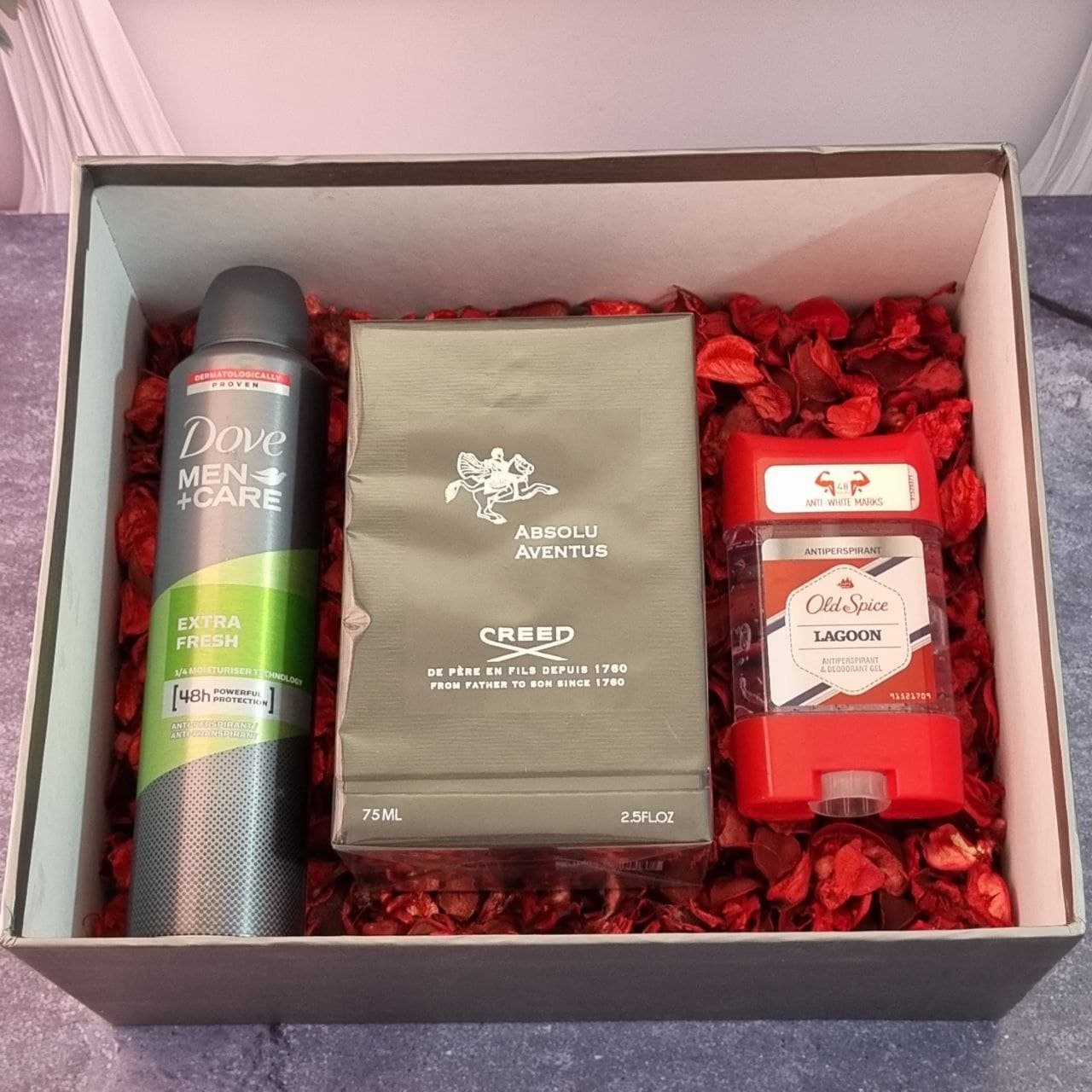 پک هدیه مردانه کد4 | عطر اونتوس ابسولو + اسپری داو + مام — تصویر ۳