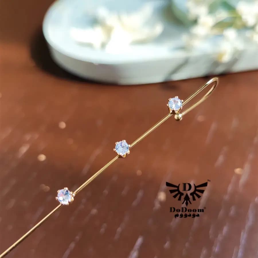 گوشواره کراس 3 نگین E38 — تصویر ۵