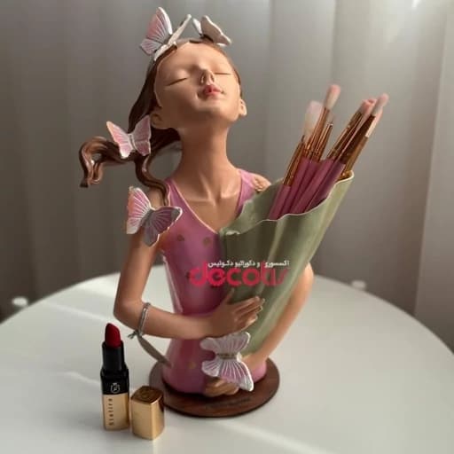 مجسمه دکوری و گلدان دختر پروانه ای