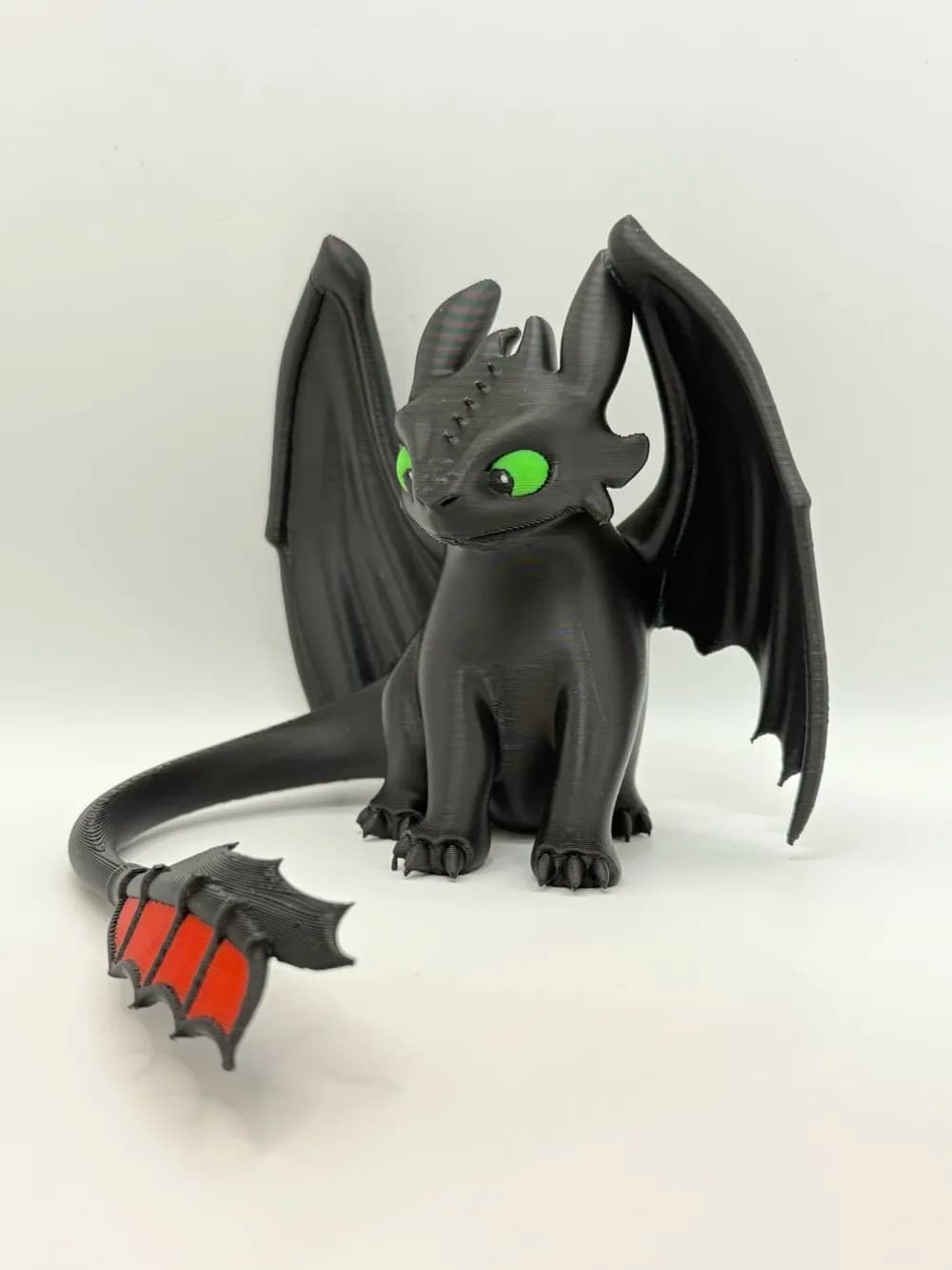 🐉 فیگور بیدندان (Toothless) | چاپ سه‌بعدی رنگ‌شده | +PLA | ارتفاع ۱۳ سانتی‌متر — تصویر ۴