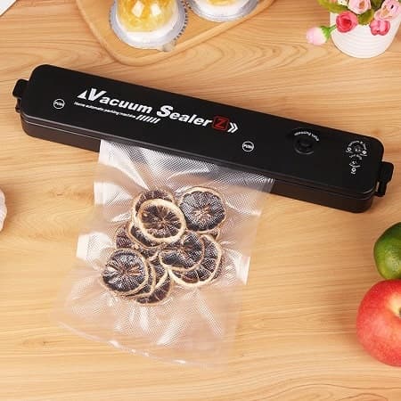 دستگاه پلمپ وکیوم خانگی کیسه فریزر vacuum sealer — تصویر ۴