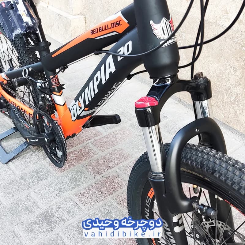 دوچرخه 20 المپیا مدل RED BULL.DISK | ردبول دیسکی مشکی نارنجی — تصویر ۳