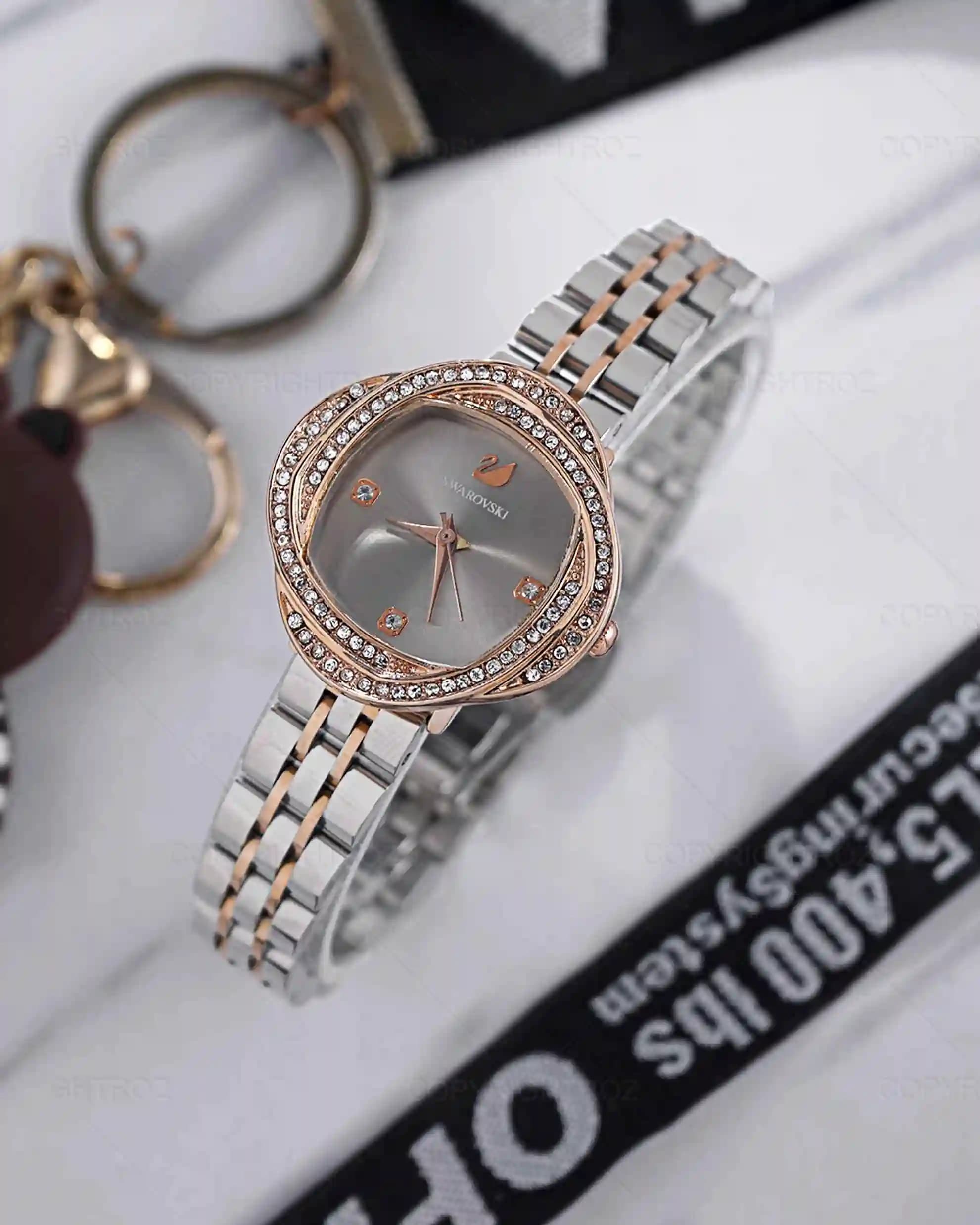 ساعت مچی زنانه سواروسکی SWAROVSKI مدل 1229 — تصویر ۱۱