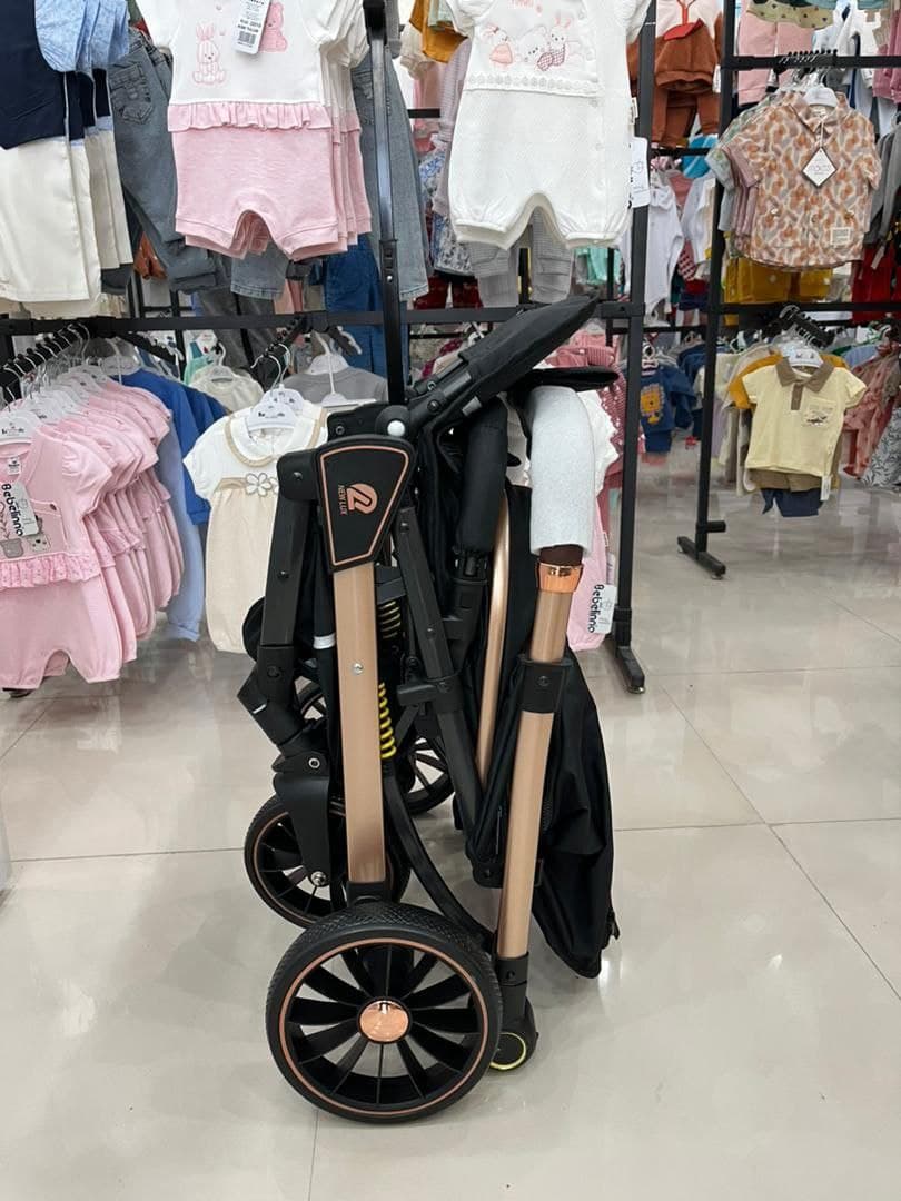 کالسکه مسافرتی روبه مادر شو نیولوکس newlux — تصویر ۹