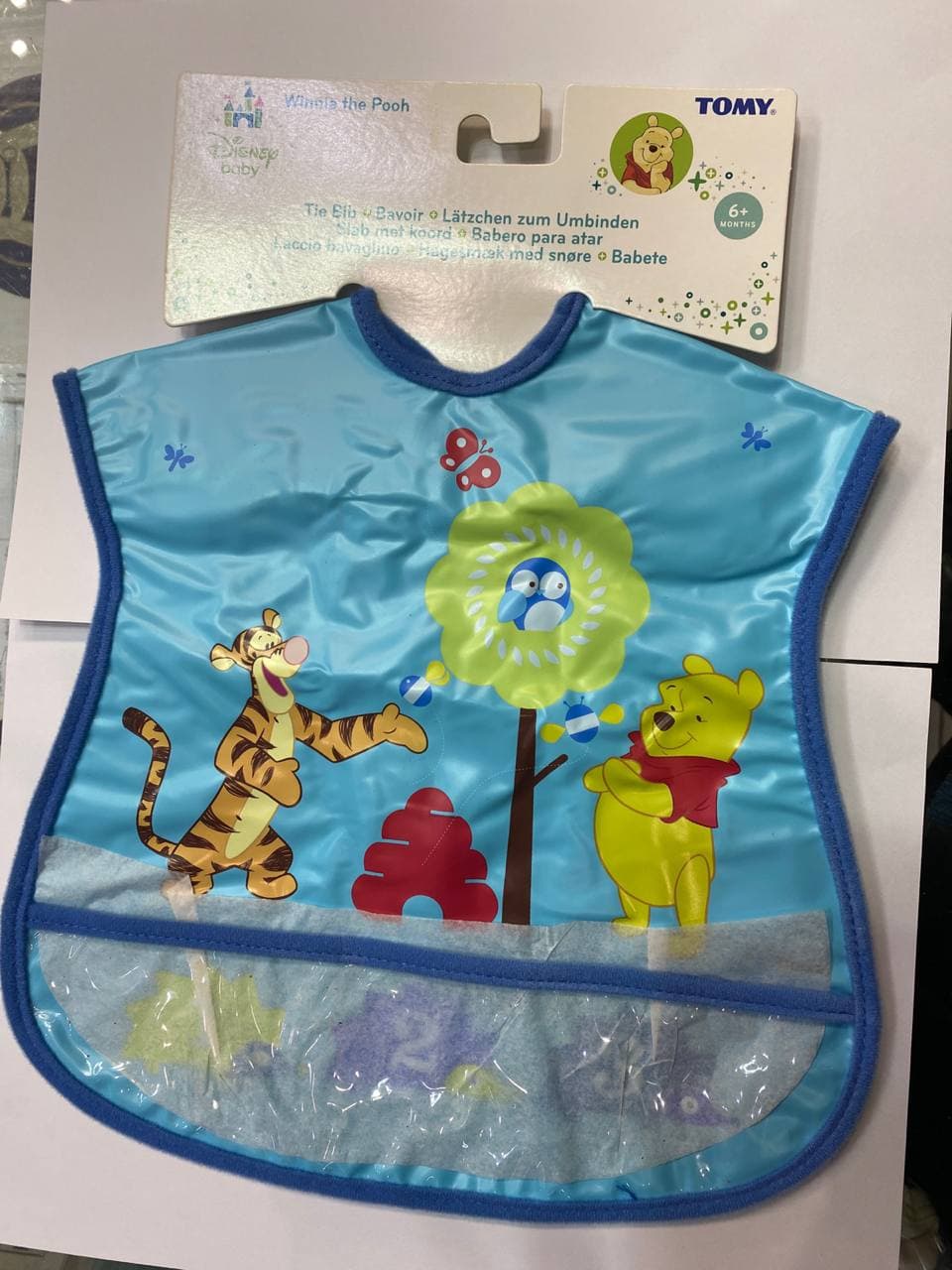 پیش بند گره پلاستیکی د فرست یر تامی تحت لیسانس دیزنی The First Years Winnie the Pooh Tie Up Bib — تصویر ۴