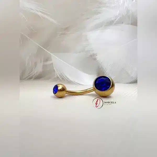 پیرسینگ ناف طلایی آبی