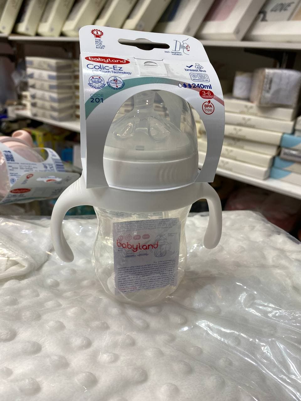 شیشه شیر طلقی pp کولیک ایز 240 میل بی بی لند دسته دار ضد نفخ babyland کد 201 — تصویر ۵