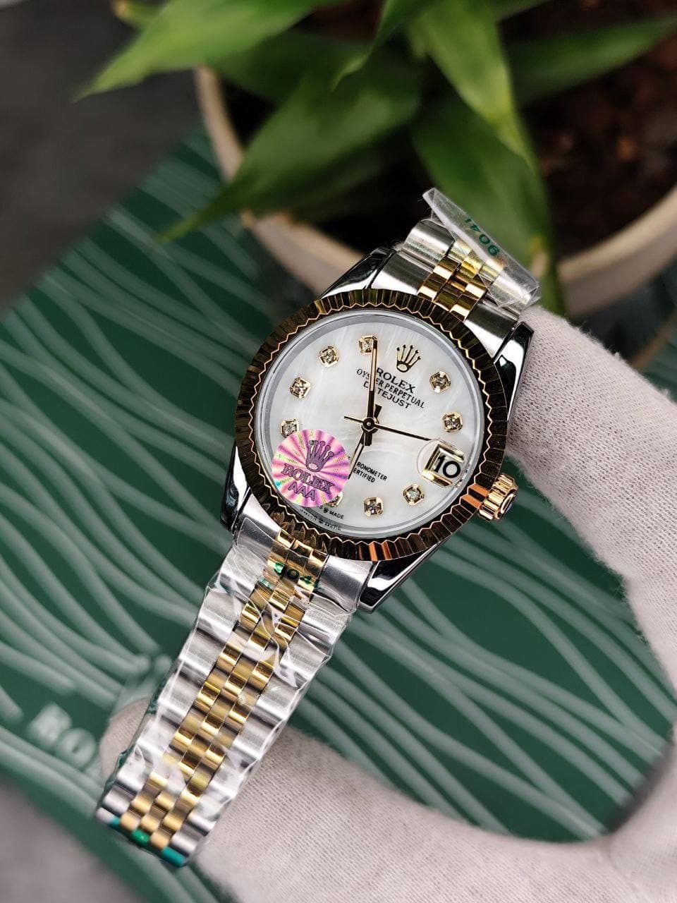 ساعت مچی زنانه رولکس دیجاست ROLEX DATEJUSY صفحه سفید بند استیل طلایی — تصویر ۳