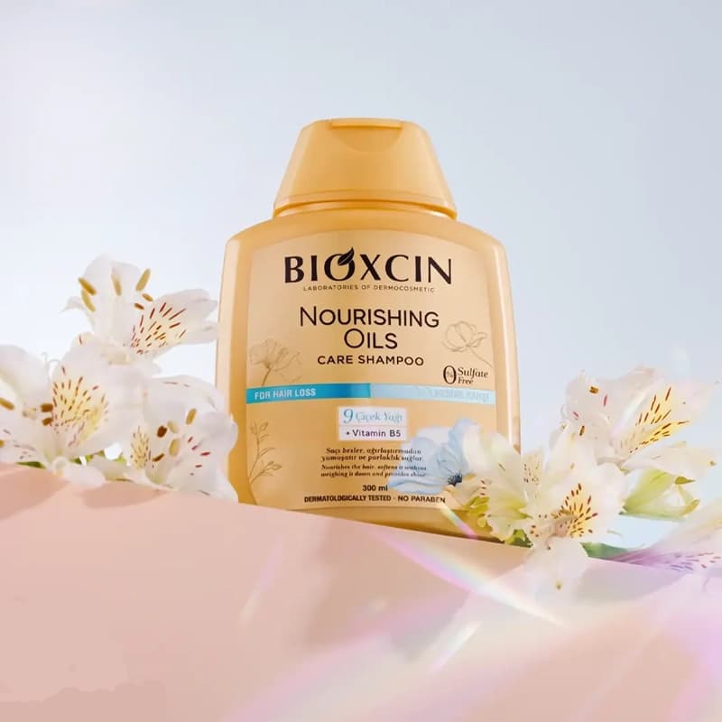 شامپو تقویت کننده و ترمیم کننده بیوکسین مدل Nourishing Oils Care حجم 300 میل — تصویر ۶