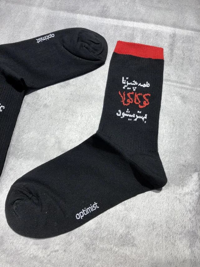 جوراب ساقدار کش انگلیسی اسپرت برند Optimist طرح تکست کوکاکولا — تصویر ۸
