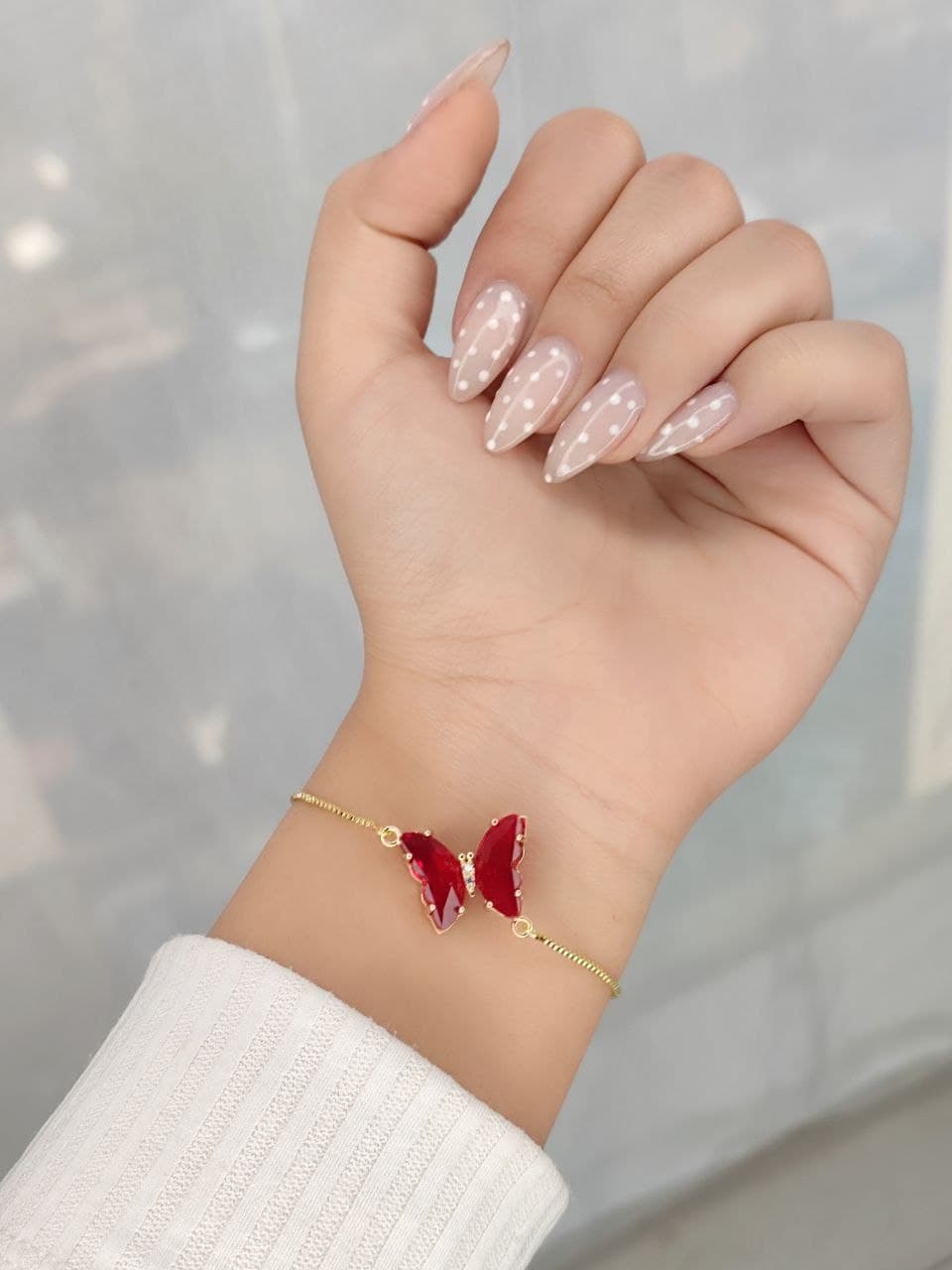 دستبند استیل دخترانه طرح پروانه ای براق کرواتی در رنگ بندی متنوع کد 1217095 — تصویر ۳