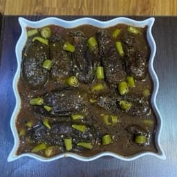 ترشی بادمجان شکم پر، رب اناری،یک کیلویی،گیلان.رشت — تصویر ۲