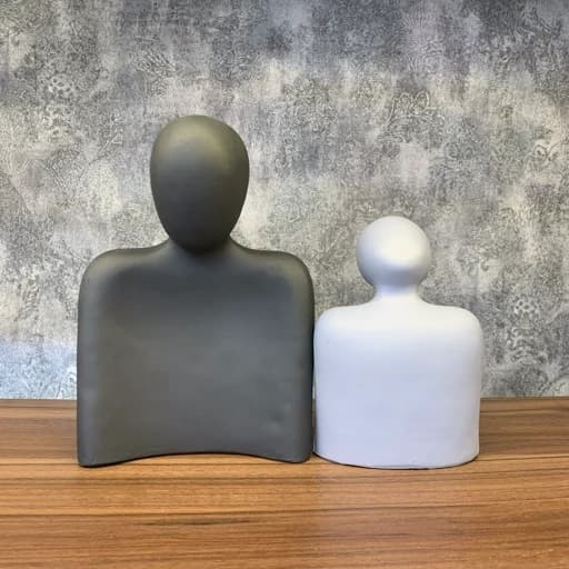 مجسمه زوج بوسه طوسی — تصویر ۳