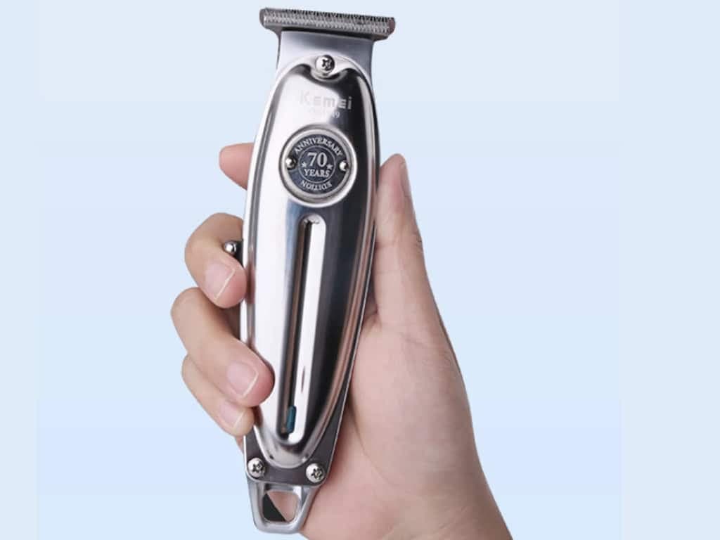 ماشین اصلاح موی سر و صورت شارژی کمی Kemei Rechargeable Hair Trimmer KM-1949 — تصویر ۶