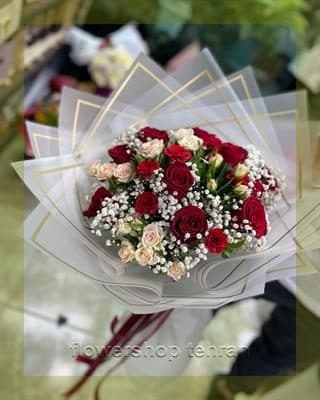 فروش عروسک بزرگ با گلهای تازه و دیزاین حرفهای