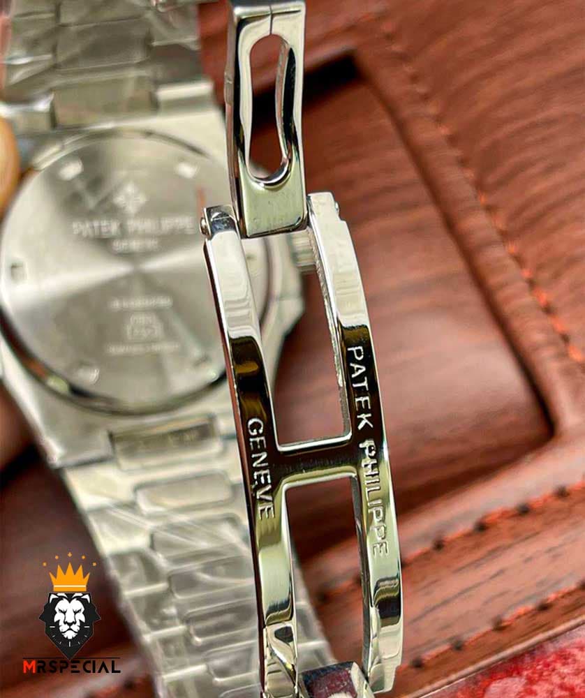 ساعت پتک فیلیپ مردانه ناتیلوس کوارتز استیل صفحه صورتی بنفش Patek Philippe NUATILOS 020768 — تصویر ۹