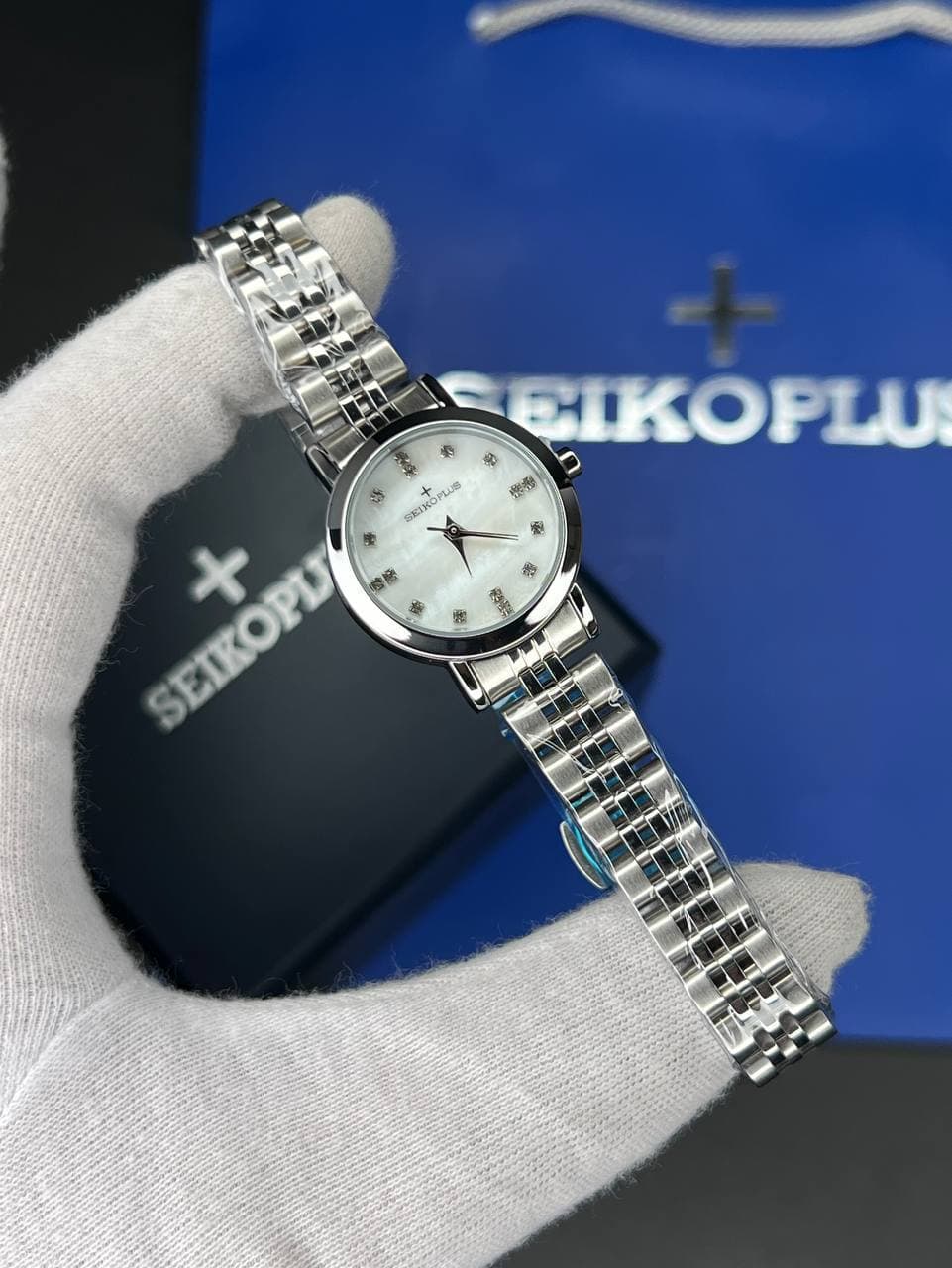 ساعت مچی زنانه سیکو پلاس SEIKO PLUS+ صفحه سفید نگین دار بند استیل — تصویر ۲