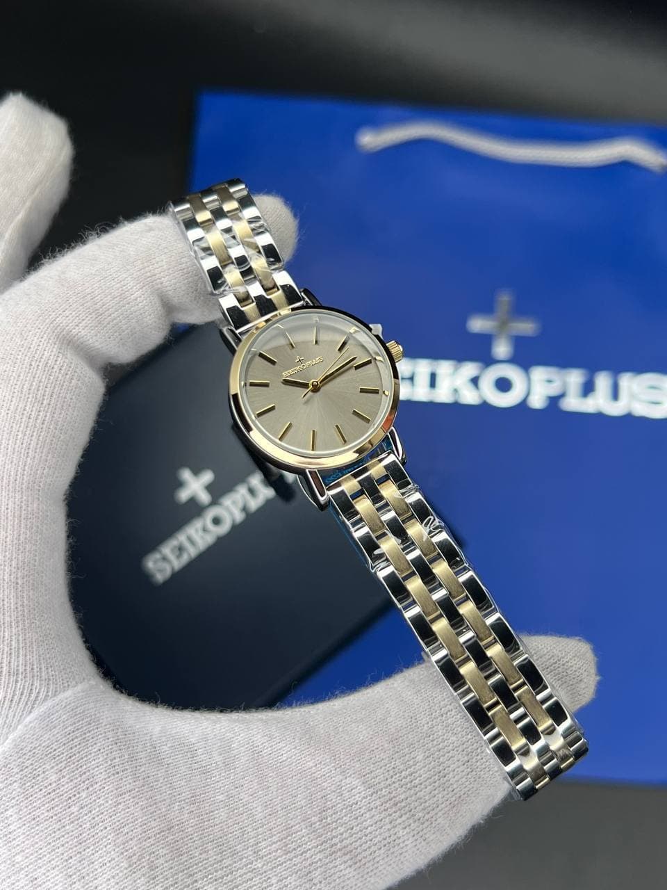 ساعت مچی زنانه سیکو پلاس SEIKO PLUS+ صفحه خاکی اندیس خطی بند استیل طلایی