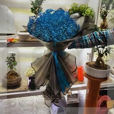 دسته گل نرگس با گلهای تازه و دیزاین حرفهای